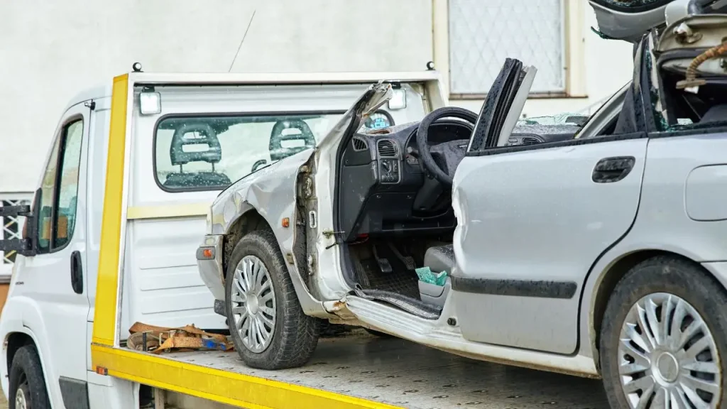 Wrecked car on a tow truck